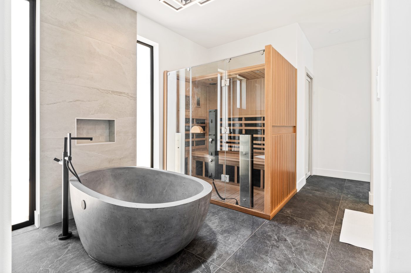 Concrete soaking tub with adjacent sauna, Scottsdale whole-home remodel
