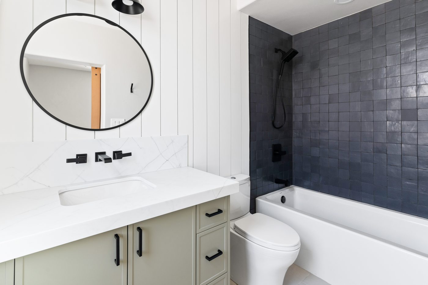 Dark tiled shower and vanity, Scottsdale whole-home remodel