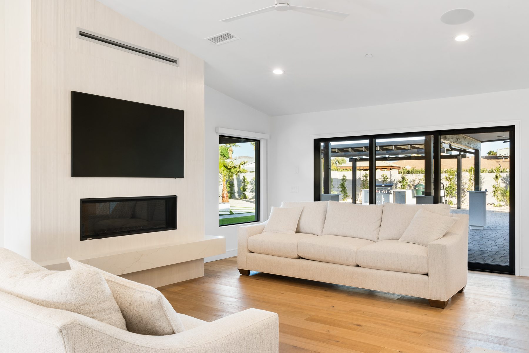 Living room with sliding glass doors, Paradise Valley custom home