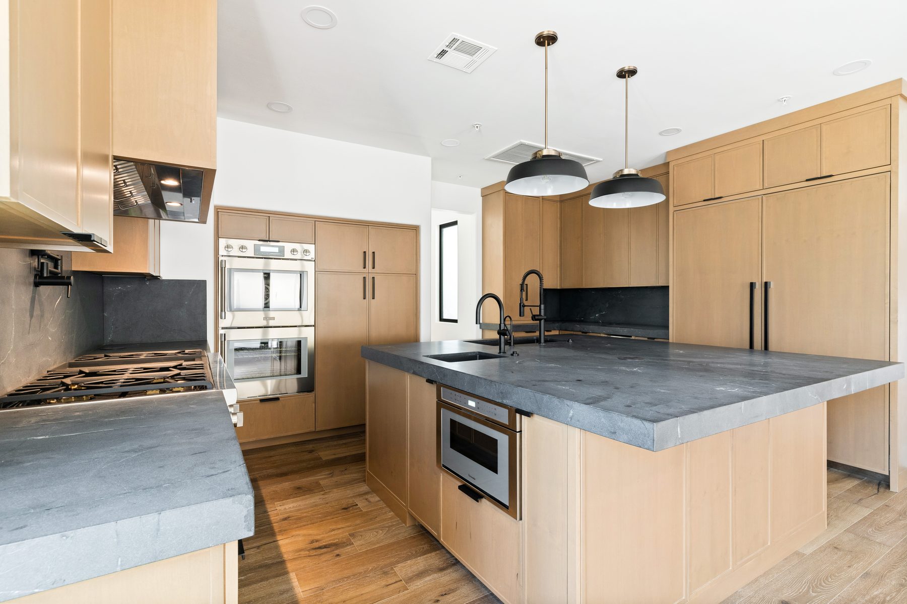 Kitchen with pendant lighting, Scottsdale whole-home remodel