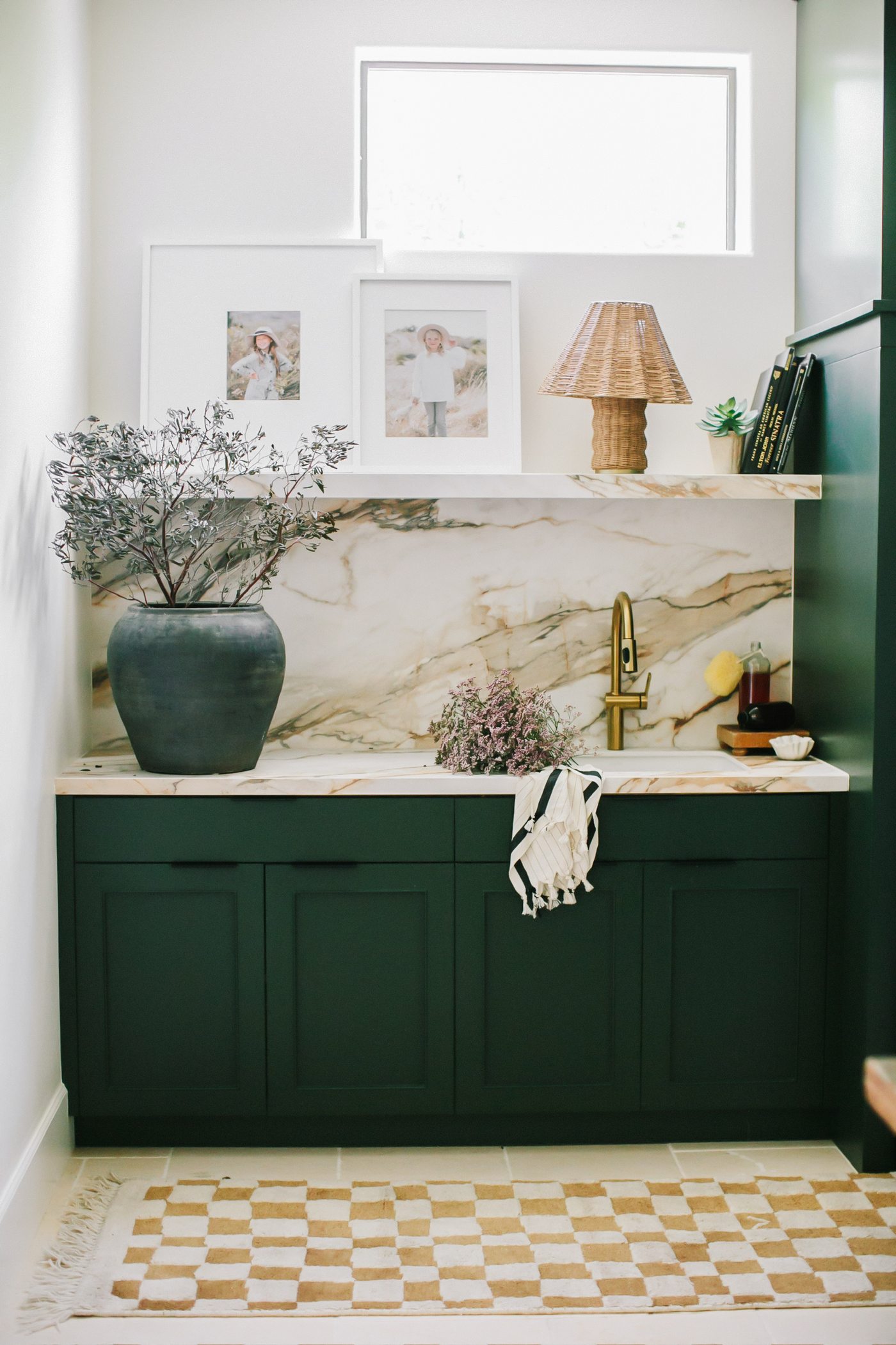 Dark green vanity with patterned tile floor, Scottsdale whole-home remodel