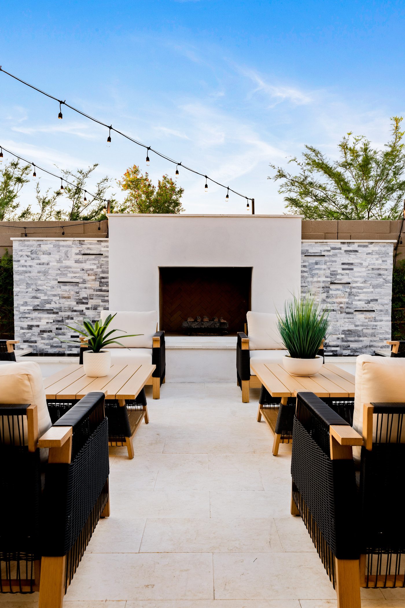 Outdoor patio with fireplace and string lights, Paradise Valley partial remodel