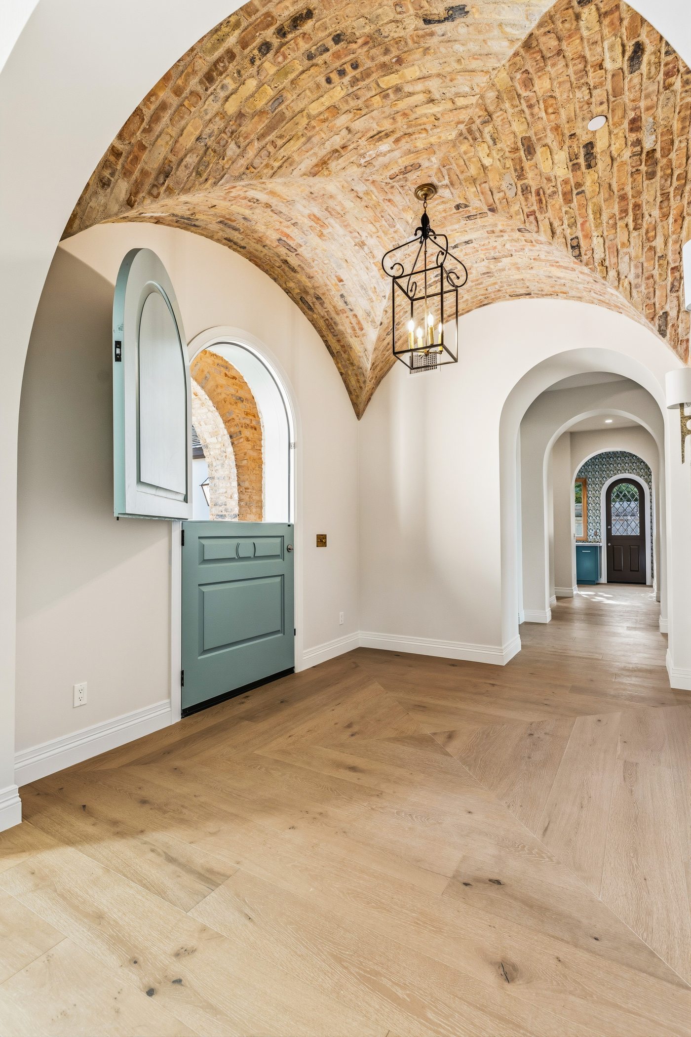 Vaulted brick barrel-ceiling hallway, Paradise Valley custom home