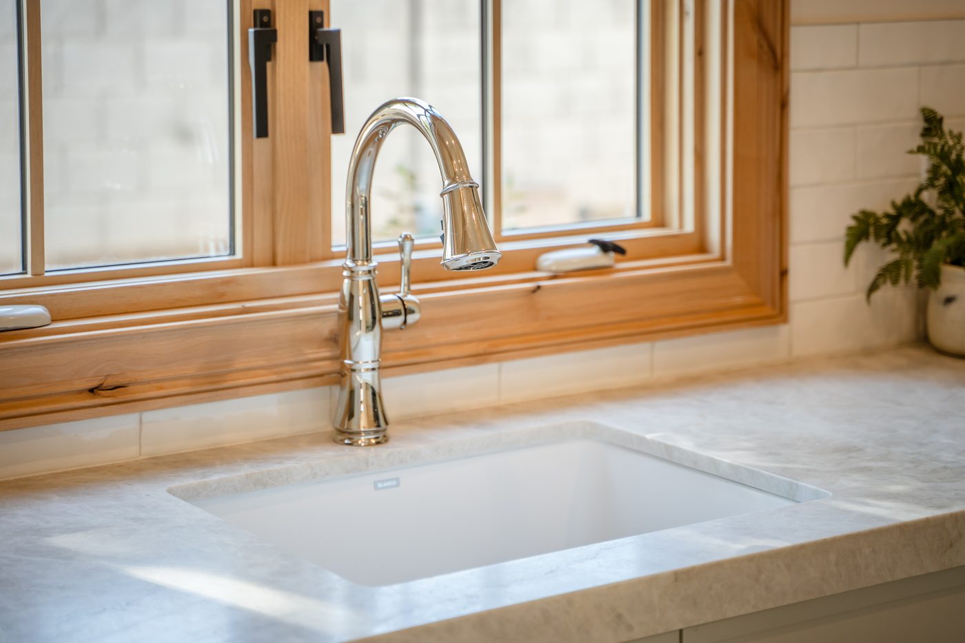 Farmhouse sink with wood-trimmed window, Paradise Valley custom home