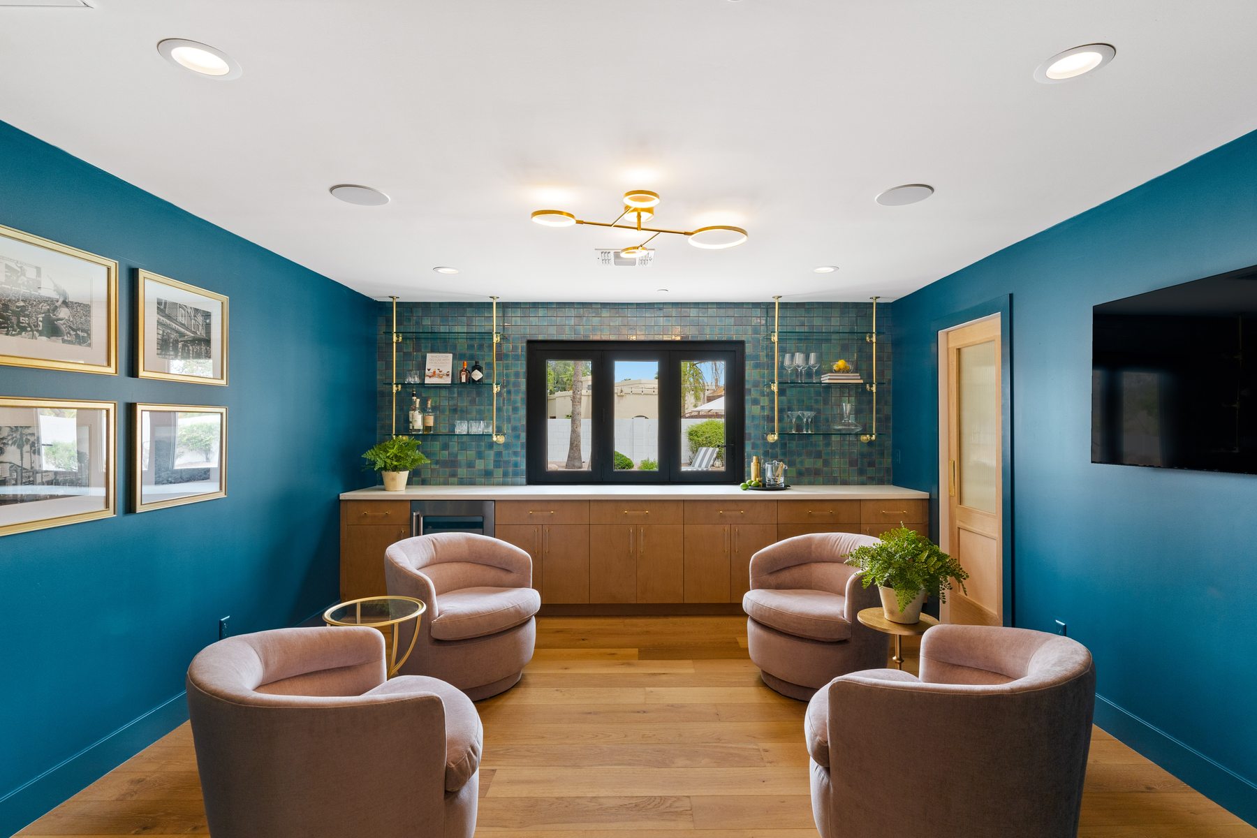 Media room with blue accent wall, Scottsdale whole-home remodel