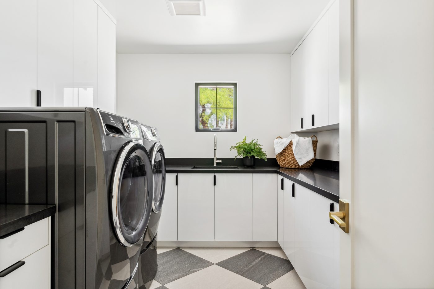 Laundry room with checkerboard floor, Scottsdale whole-home remodel