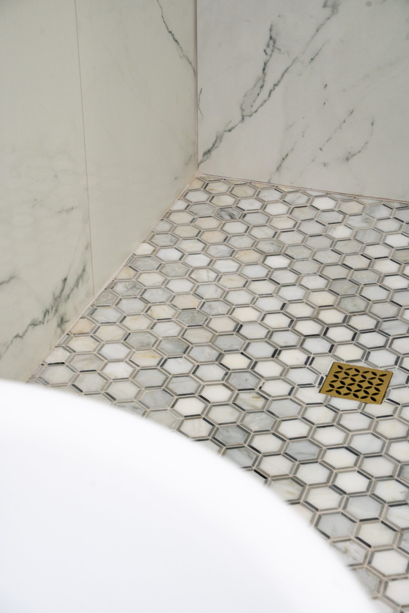 Soaking tub with hexagon tile, Scottsdale whole-home remodel
