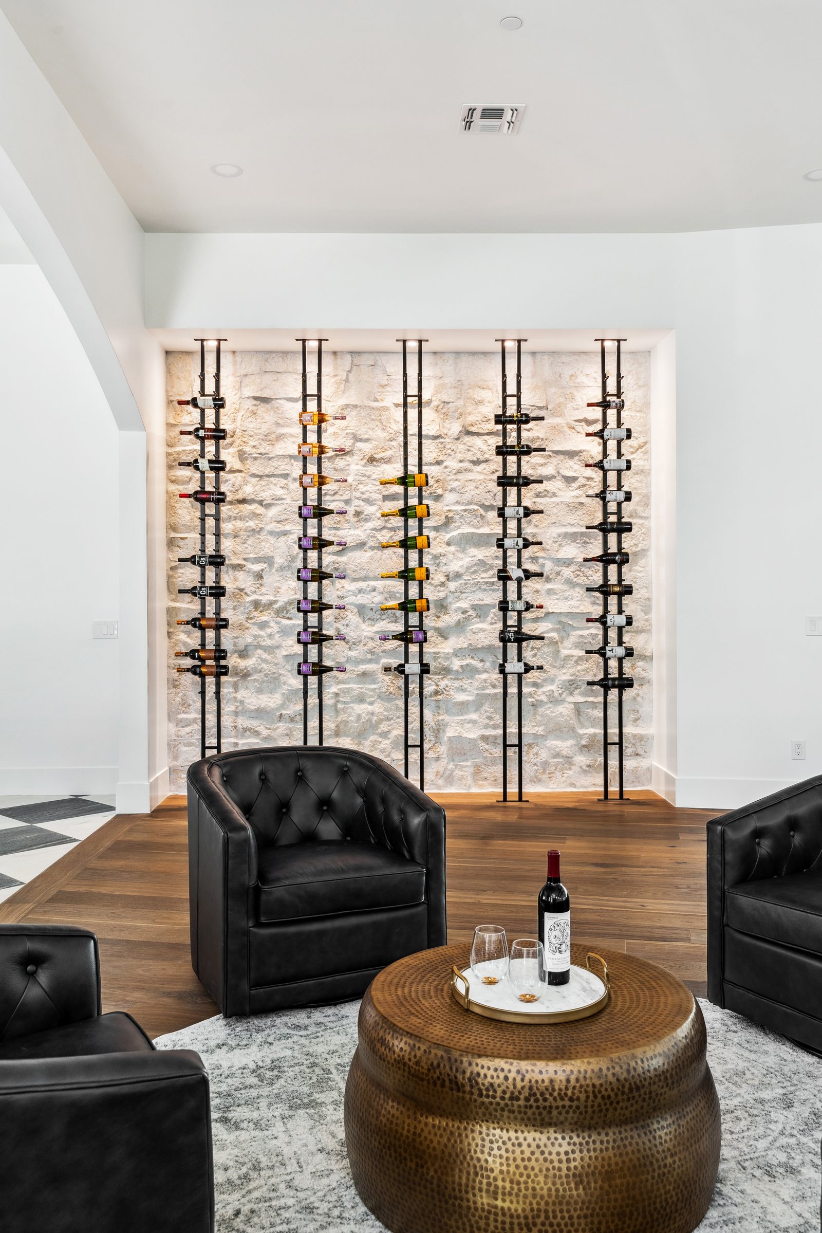 Custom wine wall and lounge seating, whole-home remodel by Trinity Remodeling, Scottsdale area