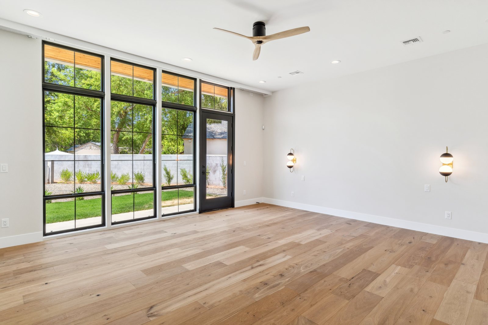 New room addition with wide sliding glass doors to the backyard, Trinity Remodeling project